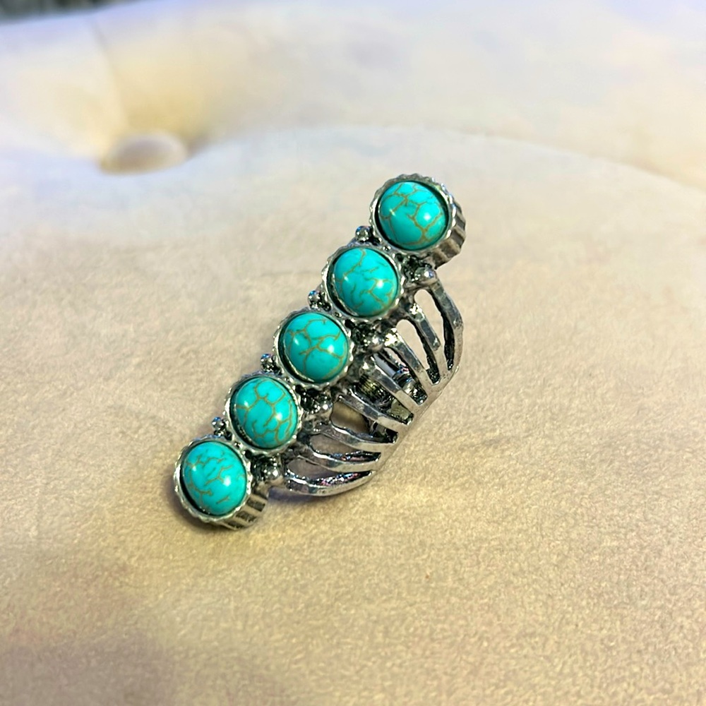 Brand new long adjustable ring with blue/green stones